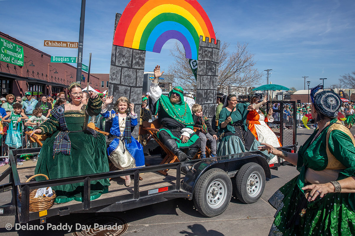 A parade float featuring a rainbow.