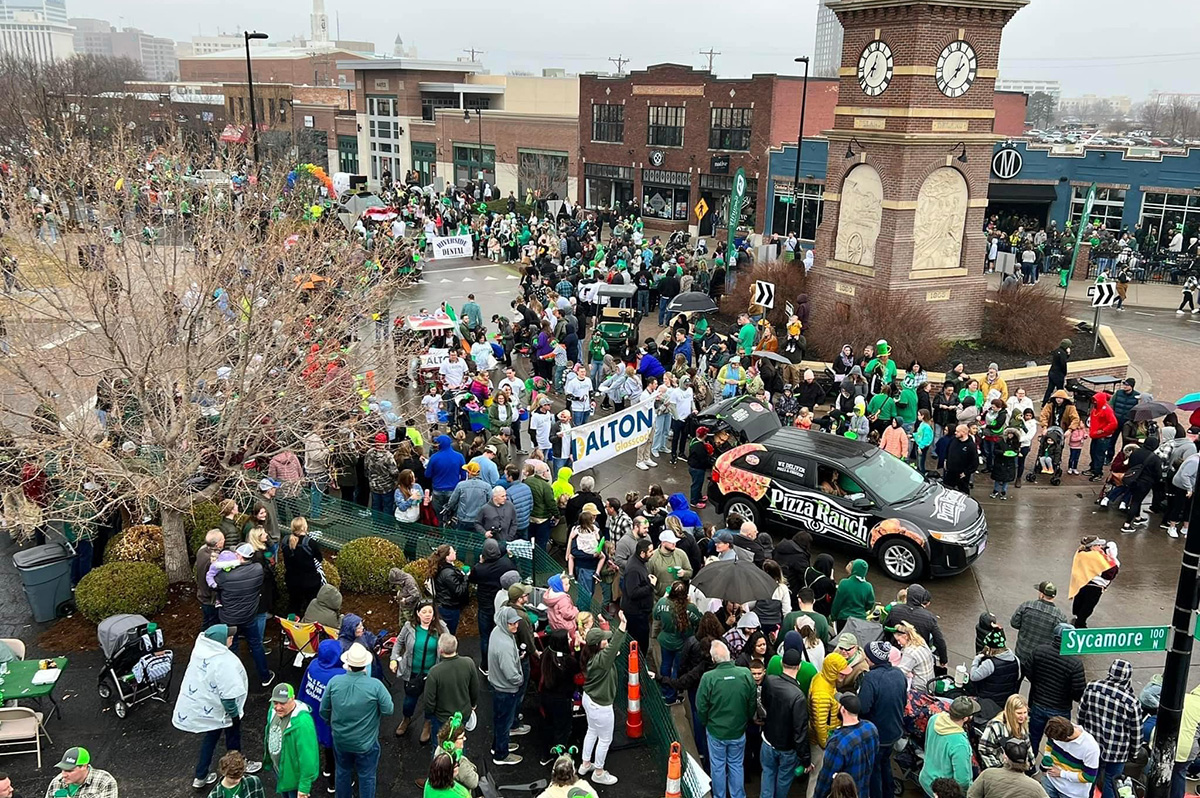 The Delano roundabout with the Paddy Day Parade proceeding through.